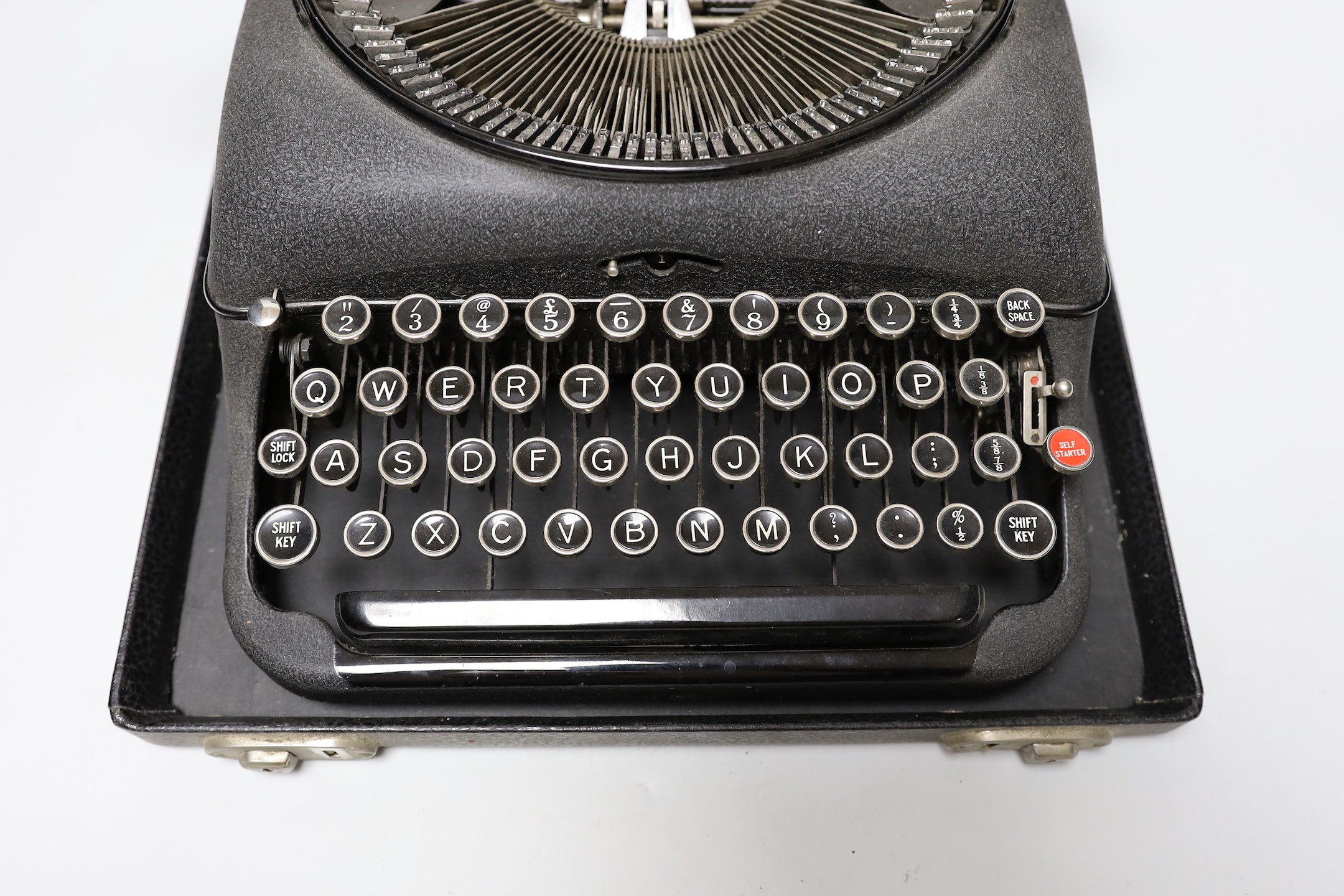 A cased Remington, British made, portable typewriter, 30cms deep